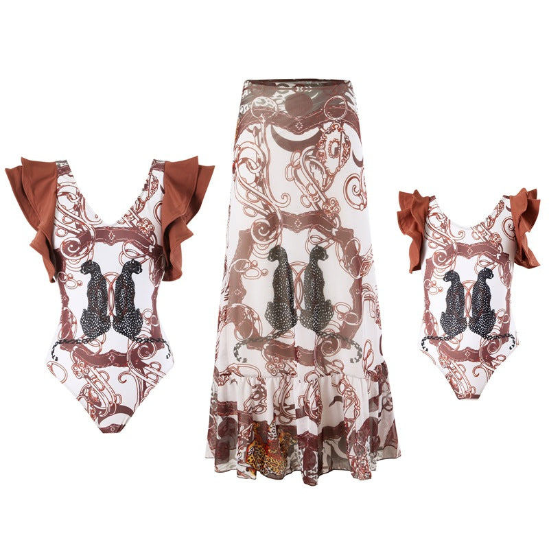 Damen Badeanzug-Set mit grafischem Design und fließendem Strandrock W&W